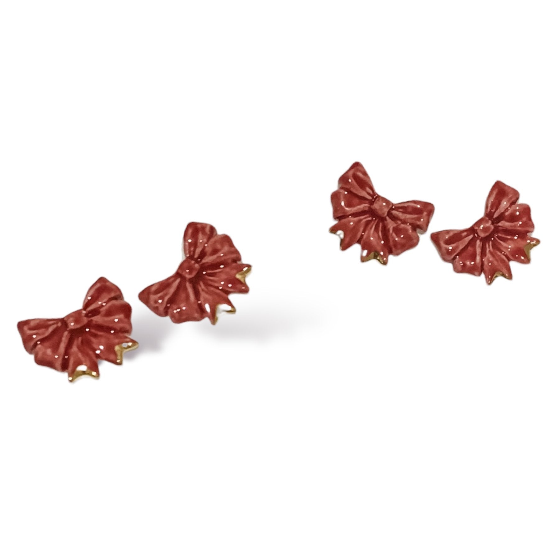 red-bow-studs-by-susan-gordon-pottery-accessories-jewelry-earrings-georgia-kate